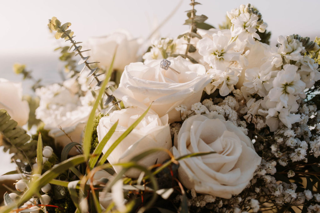 engagement ring in white flowers