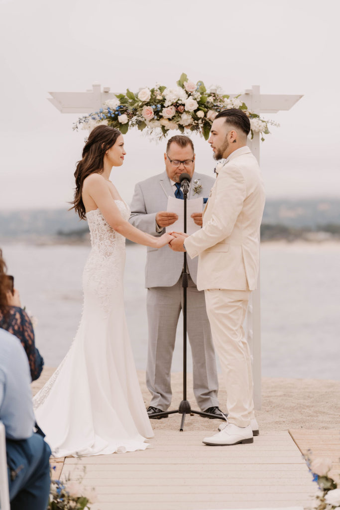 bride and groom at the altar at Romantic Beach Wedding in Carmel, CA