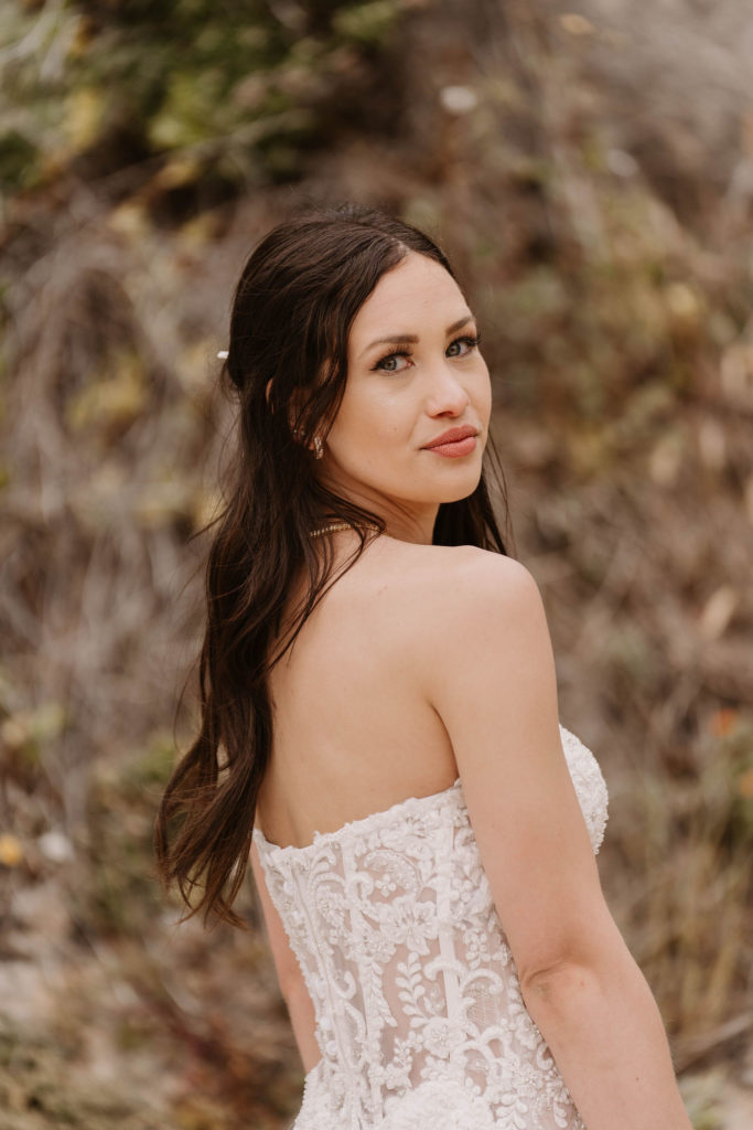 bride  posing on the beach