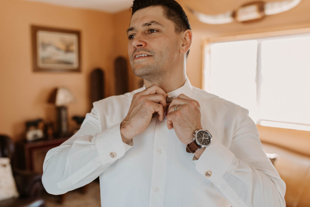 Groom getting ready for Woodland California wedding