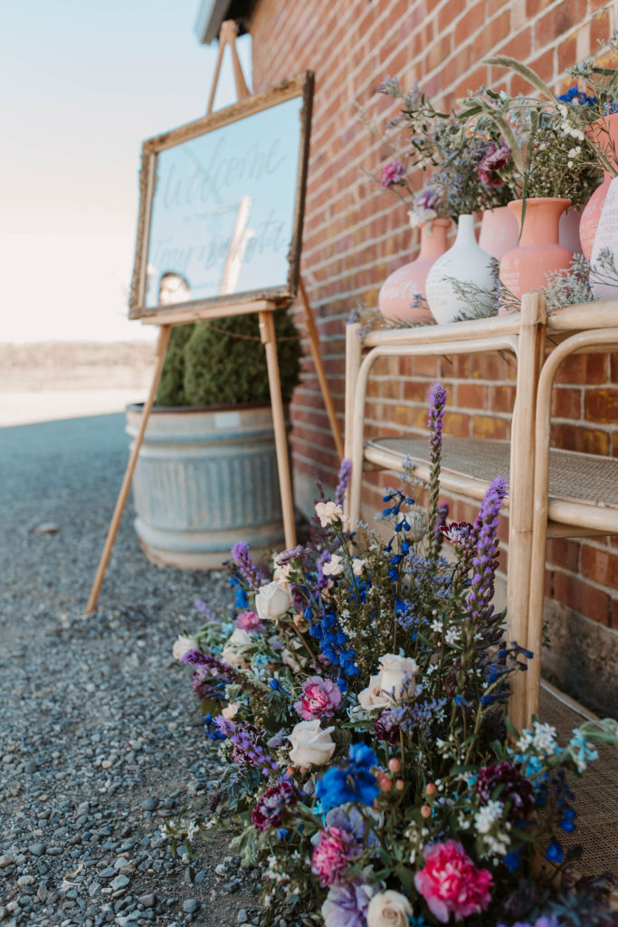 Wedding welcome sign and wedding flowers