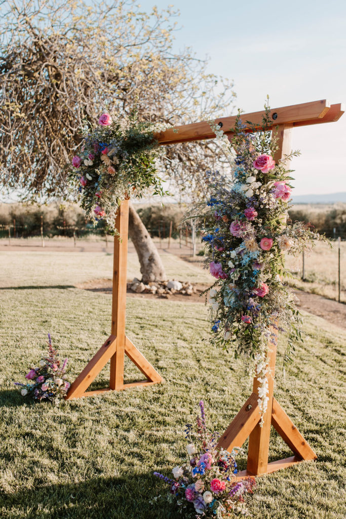 Wedding arch with spring florals