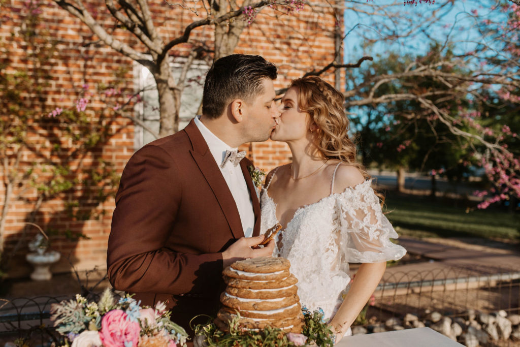 Bride and groom portraits after pastel spring wedding 