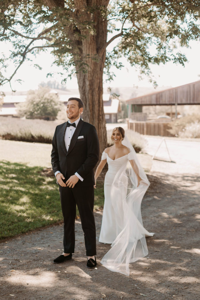 bride and grooms wedding first looks