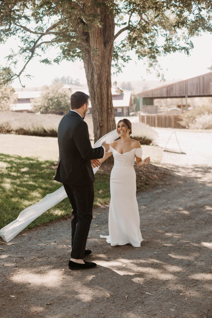 bride and grooms wedding first looks