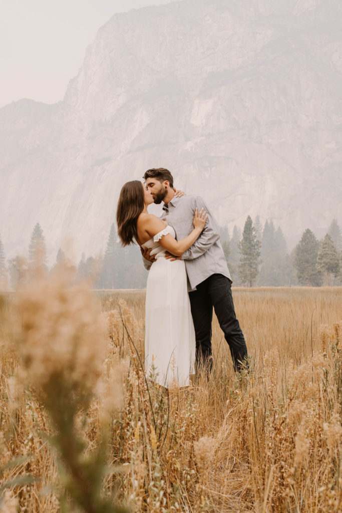 Couple posing for anniversary photos in a national park