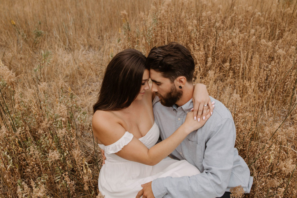 Couple posing for anniversary photos in a national park