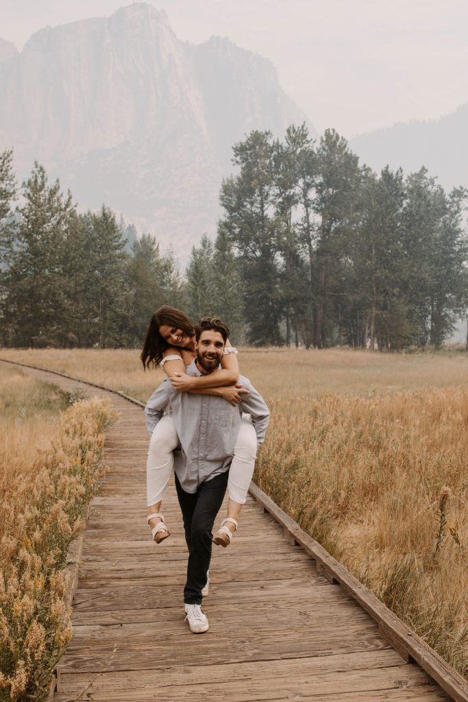 Couple posing for anniversary photos in a national park