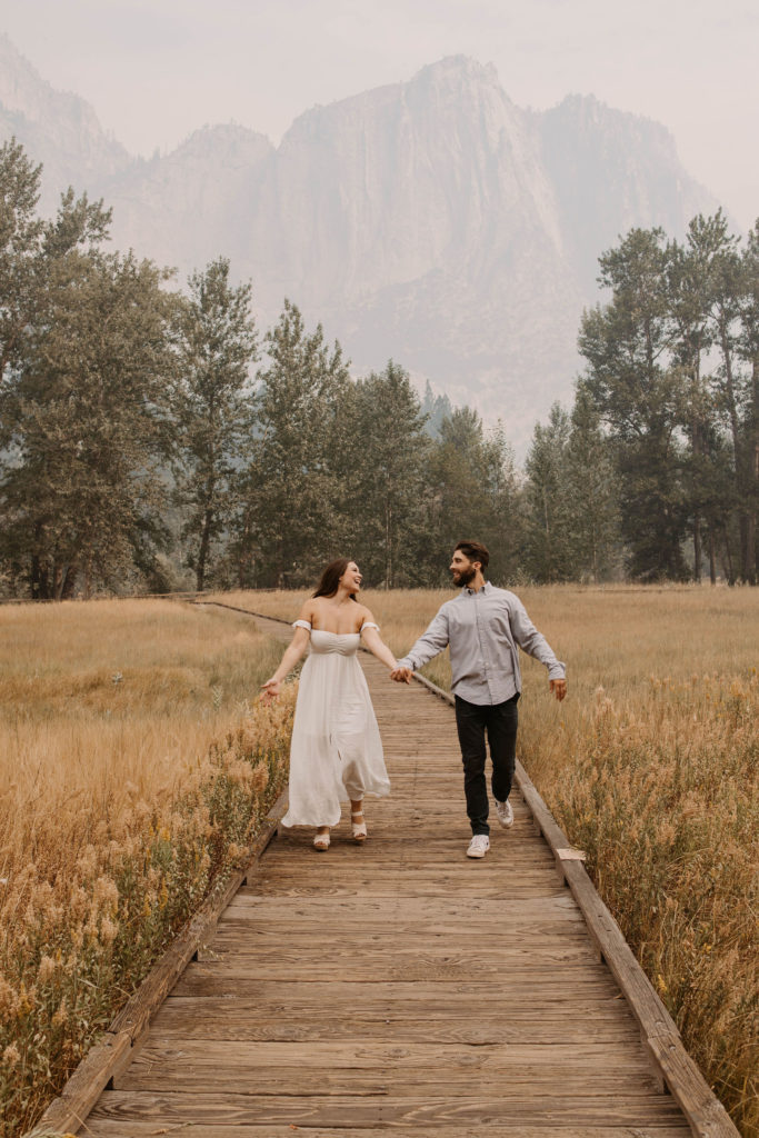 Couple posing for anniversary photos in a national park