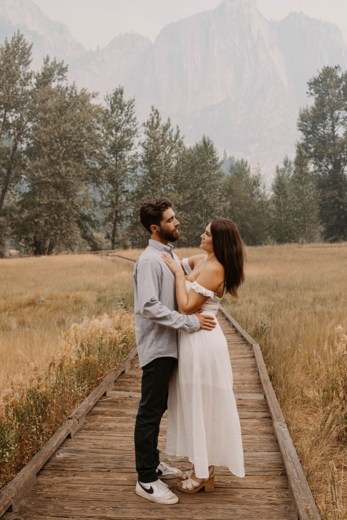 Couple posing for anniversary photos in a national park