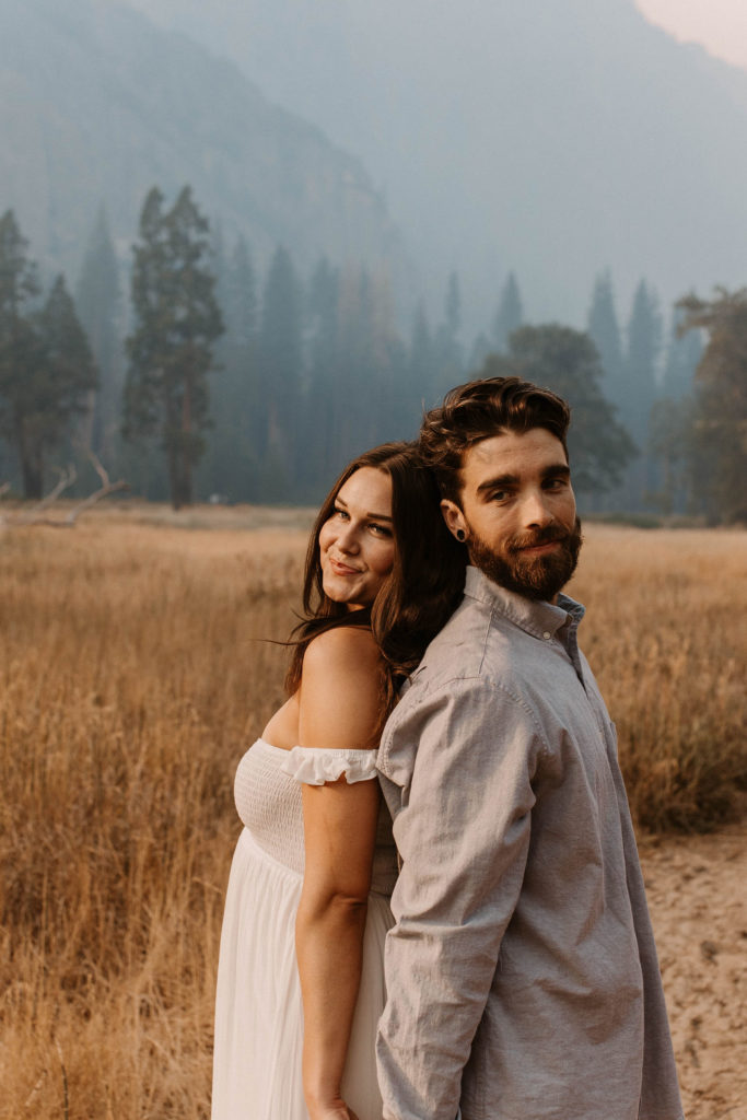 Couple posing for anniversary photos in a national park