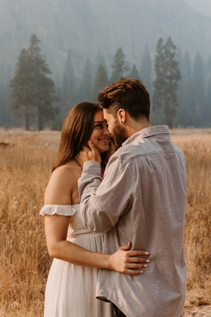 Couple posing for anniversary photos in a national park