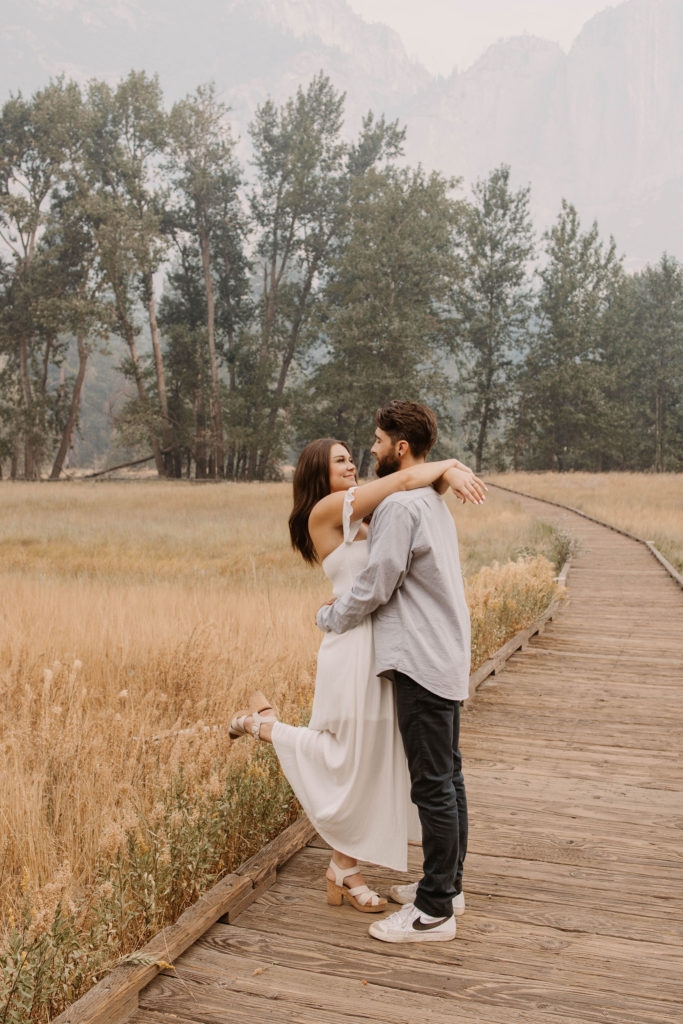 A couple posing for their September Yosemite anniversary photos