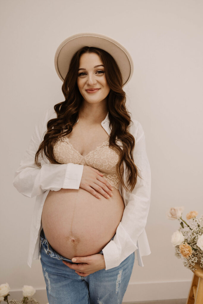 Pregnant woman posing for photoshoot