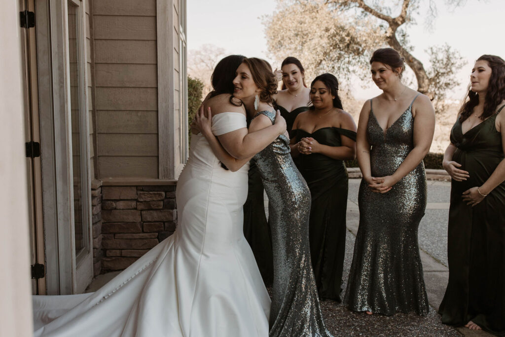 Brides first look with bridesmaids