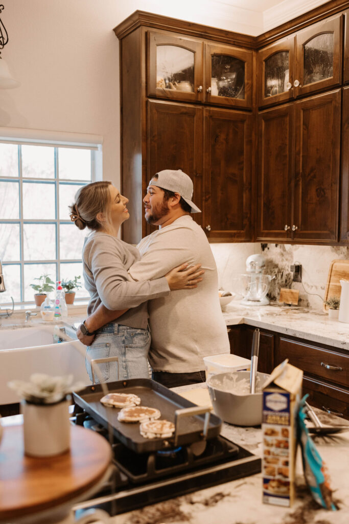 Couple dancing in their kitchen