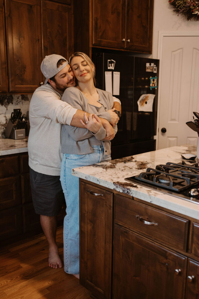 Couple in their kitchen during photoshoot