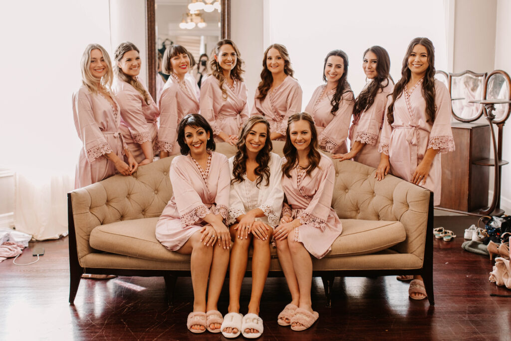 Bride and bridesmaids in bridal pajamas before wedding